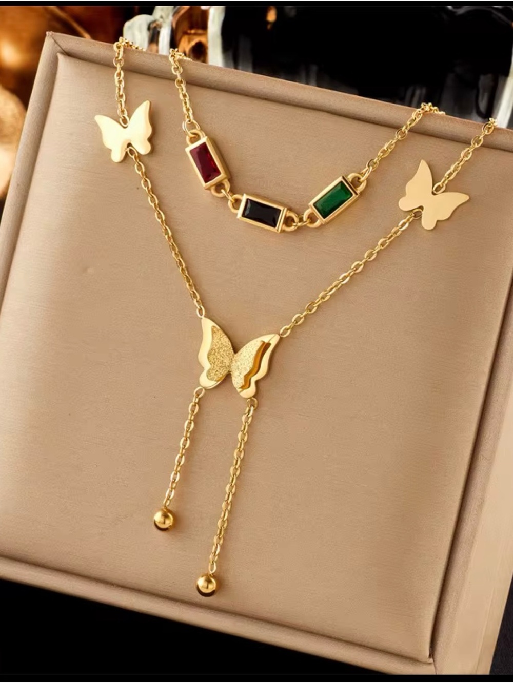Gold Butterfly Layered Necklace with Red, Black & Green Gem Accents